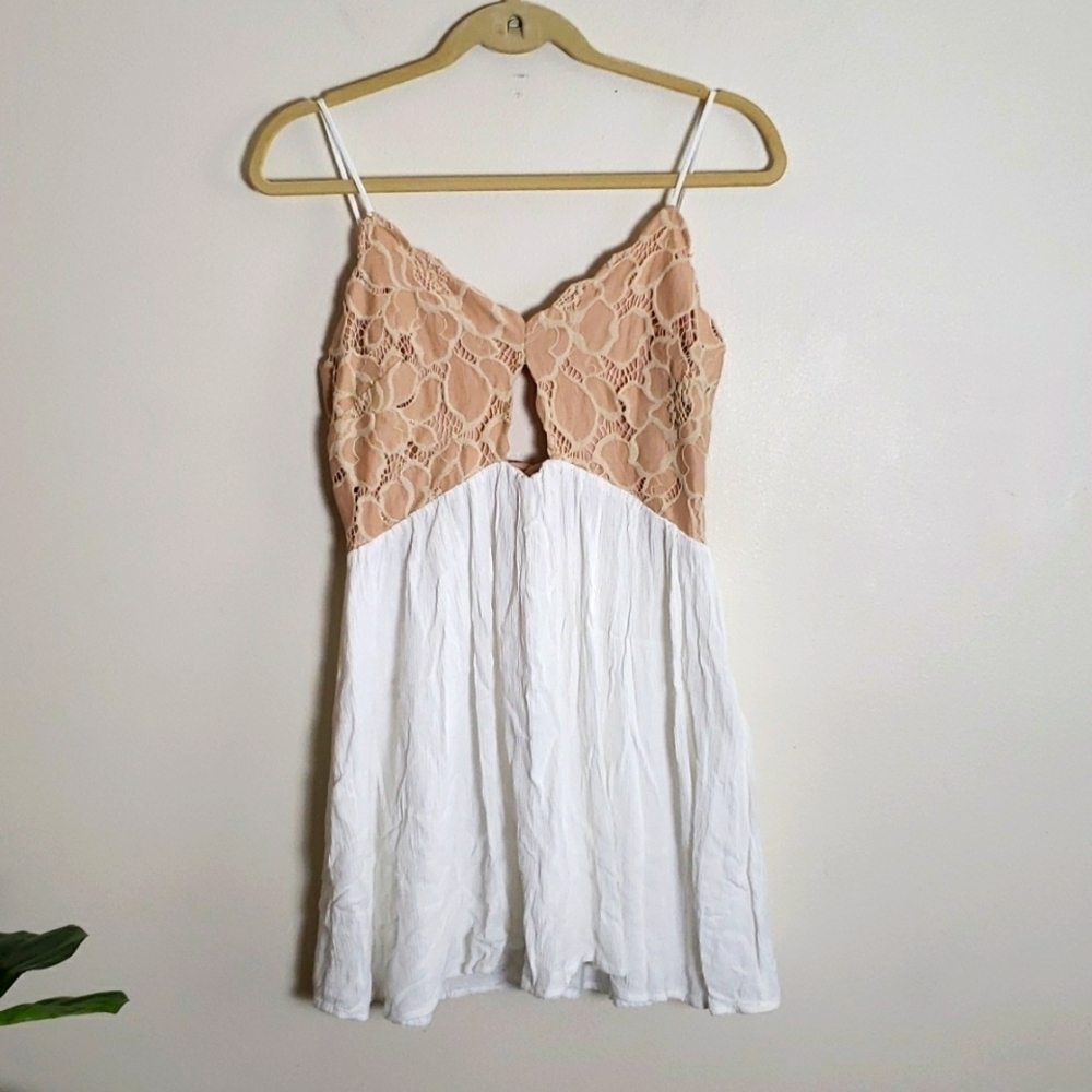 Tularosa Bryce mini dress, babydoll dress, women's size medium.